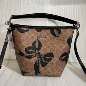 Coach City Bucket Bag In Signature Canvas With Bow Print cy651